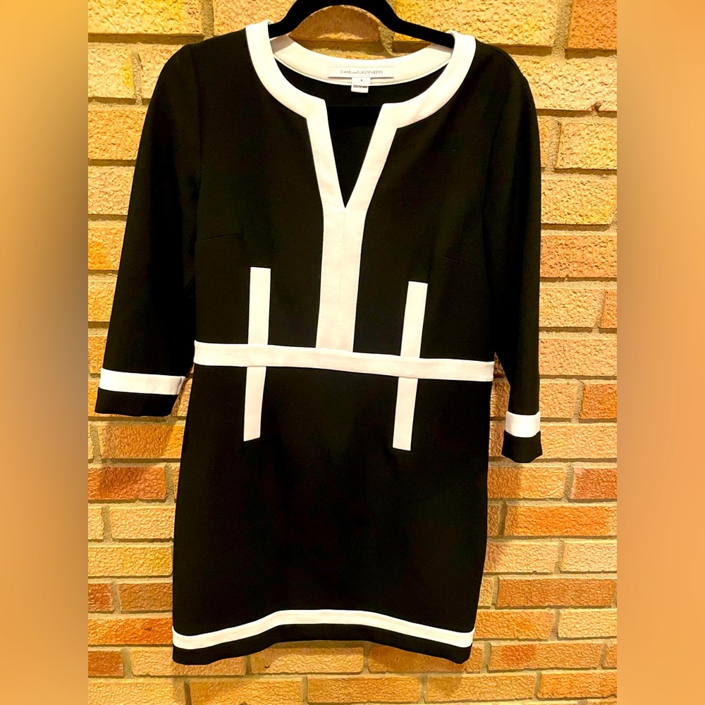 DVF Black & White dress.  3/4 sleeve, side zip, size 8.  Runs true to size.